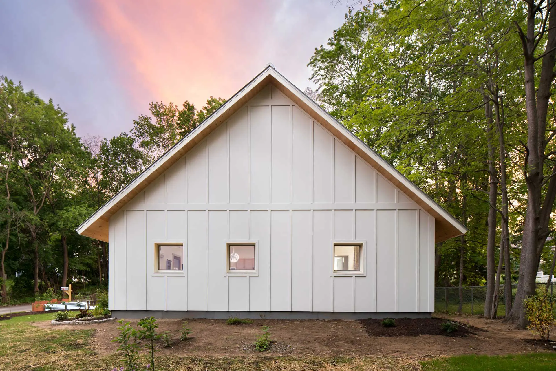 Ecocor Passive House Goldenrod Morse Court House with white exterior, Ecocor Passive House Goldenrod Morse Court